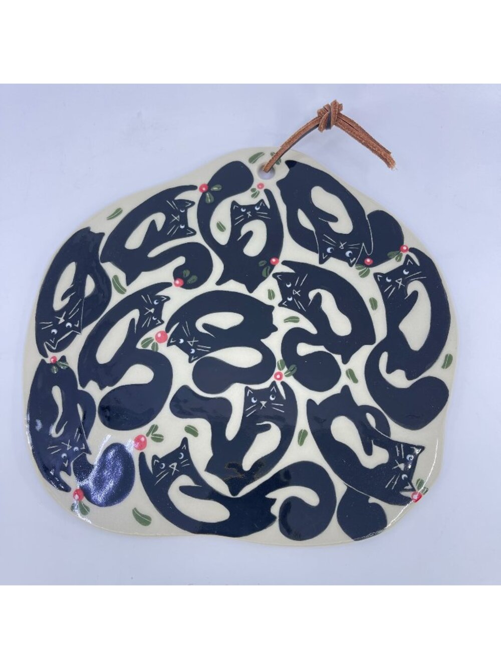 handcrafted ceramic black cat wall hanging/platter with leather hanging loop